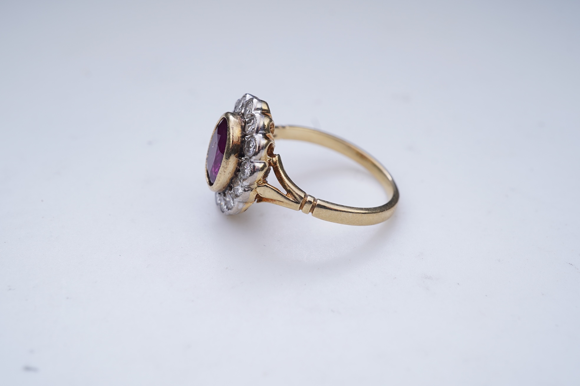 A ruby and diamond cluster ring